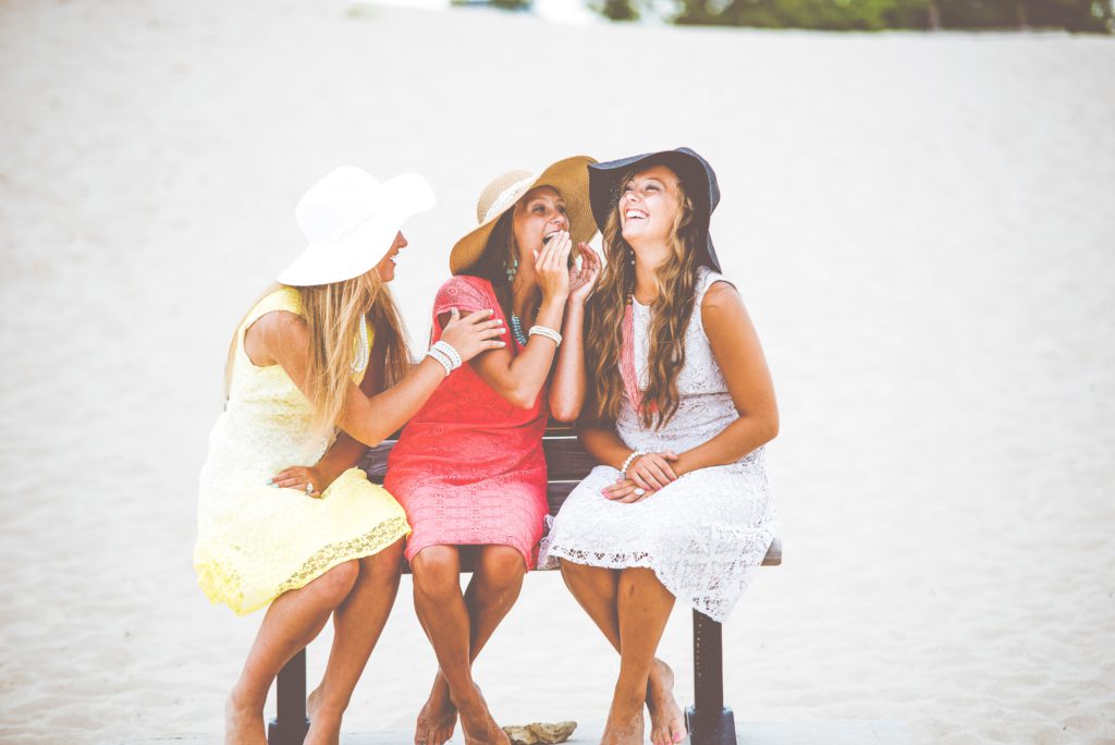three girls joking together
