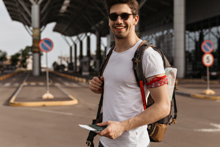 man smiling in the summer